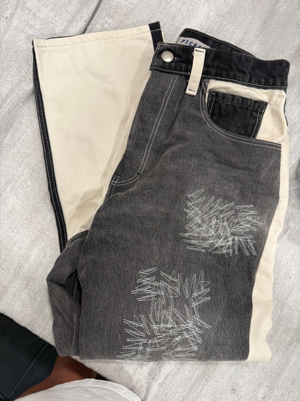 Two-Tone Black and Cream Jeans with Contrast Stitching